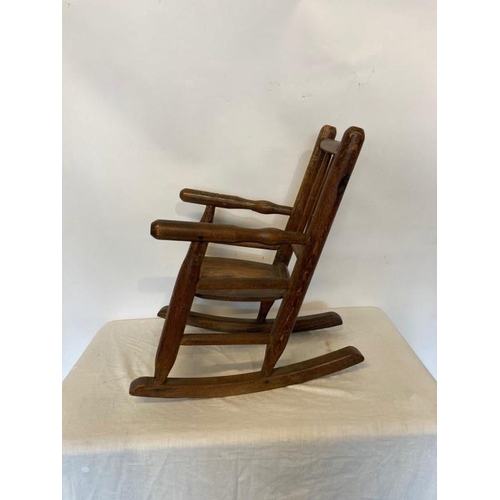 286 - Antique timber child's rocker.