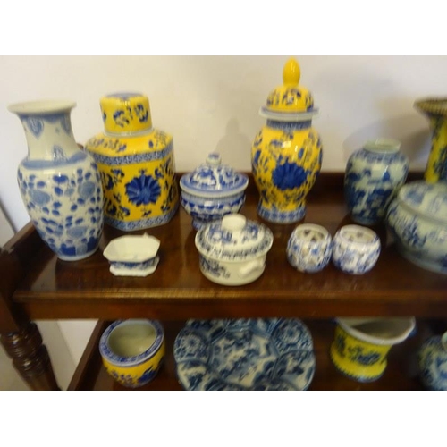 301 - Collection of blue and white & yellow and blue chinaware. 15 pieces approx.