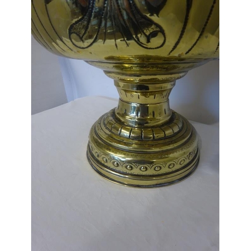 303 - A good Victorian brass jardinere on pedestal base having lion mask ring handles.. H. 47cm approx.