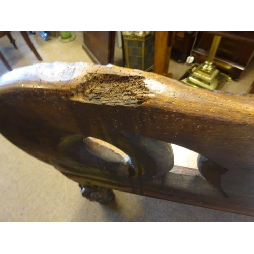 306 - An antique carved walnut hall bench, the back with a central heraldic sheild carved Nun Quam Non Par... 