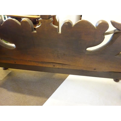 306 - An antique carved walnut hall bench, the back with a central heraldic sheild carved Nun Quam Non Par... 