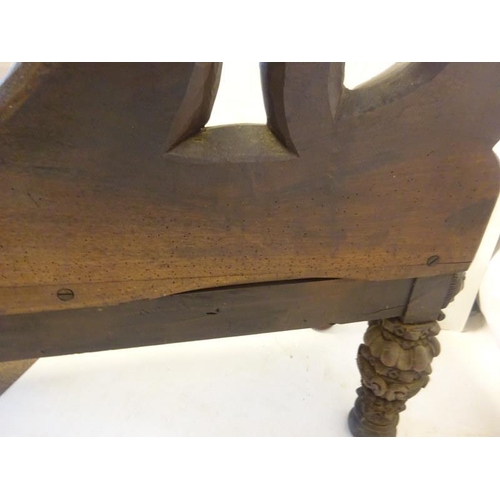 306 - An antique carved walnut hall bench, the back with a central heraldic sheild carved Nun Quam Non Par... 