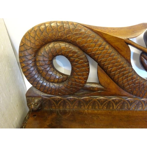 306 - An antique carved walnut hall bench, the back with a central heraldic sheild carved Nun Quam Non Par... 