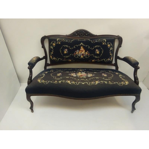 307 - Late 19th century mahogany framed settee with needlework upholstery.