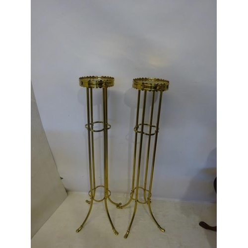 311 - A pair of church brass stands. H. 110cm approx.