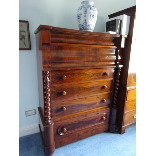 314 - A large Victorian mahogany scotch chest of drawers having barley twist columns and six drawers of va... 