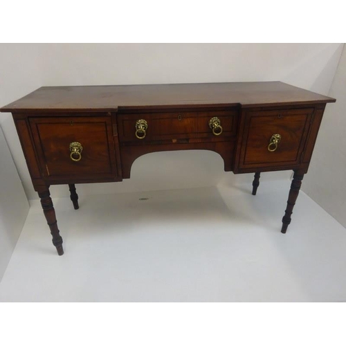 317 - Regency mahogany sideboard, the reeded top over cupboards and drawer with lion mask handles and rais... 