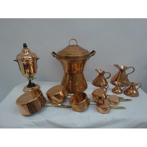 323 - Collection of copper ware to include measures, saucepans, tea urns, etc. (12)