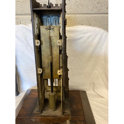 341 - A 19th century heavy metal clock tower in the Pugin style, the clock with single fusee movement. Clo... 