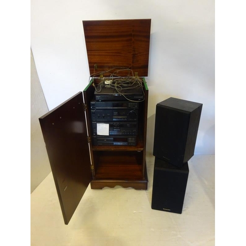 37 - A music system housed in inlaid mahogany case. (One tape deck not working)