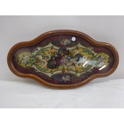 43 - Victorian needlework housed in an attractive walnut frame. 57cm x 30cm approx.