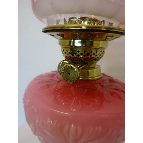 49 - Victorian oil lamp with red glass shade.