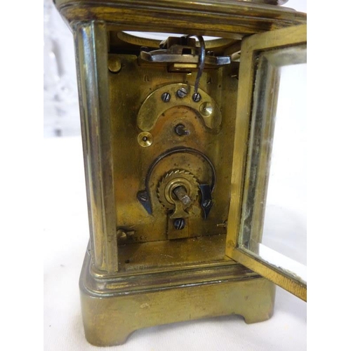 52 - Small French brass carriage clock (dial cracked) and two miniature Quartz's clocks.