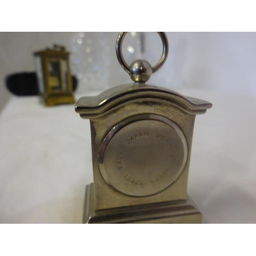 52 - Small French brass carriage clock (dial cracked) and two miniature Quartz's clocks.