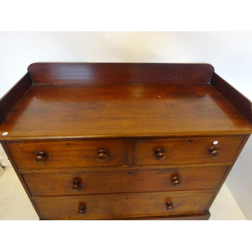 56 - Victorian mahogany tray back chest of two short and two long drawers raised on plinth base. W. 114cm... 