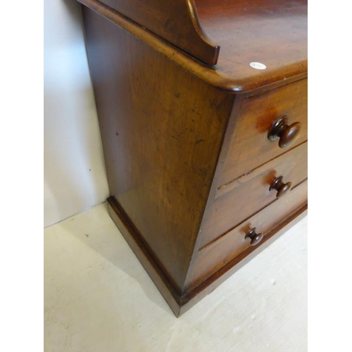 56 - Victorian mahogany tray back chest of two short and two long drawers raised on plinth base. W. 114cm... 