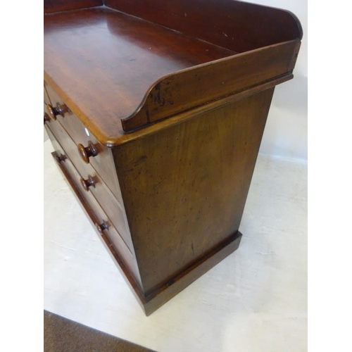 56 - Victorian mahogany tray back chest of two short and two long drawers raised on plinth base. W. 114cm... 