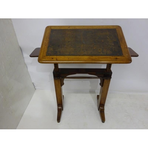 65 - A 19th century oak drawing or writing table, adjustable.