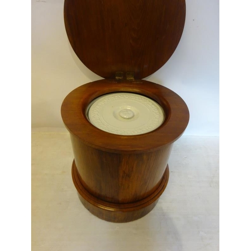 68 - A good Victorian circular shaped mahogany commode.