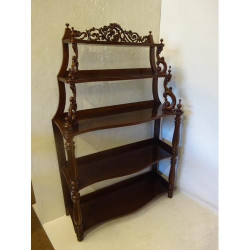 69 - Victorian mahogany five tier whatnot, the shaped shelves having carved and turned supports. H. 157cm... 