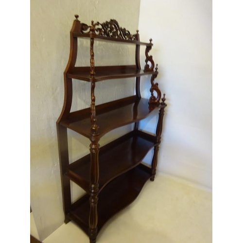 69 - Victorian mahogany five tier whatnot, the shaped shelves having carved and turned supports. H. 157cm... 