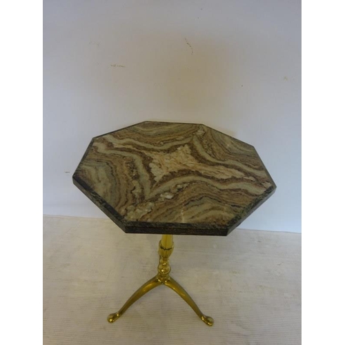 81 - Marble topped occasional table having brass column and tripod base.