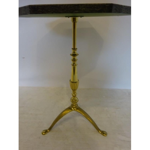 81 - Marble topped occasional table having brass column and tripod base.