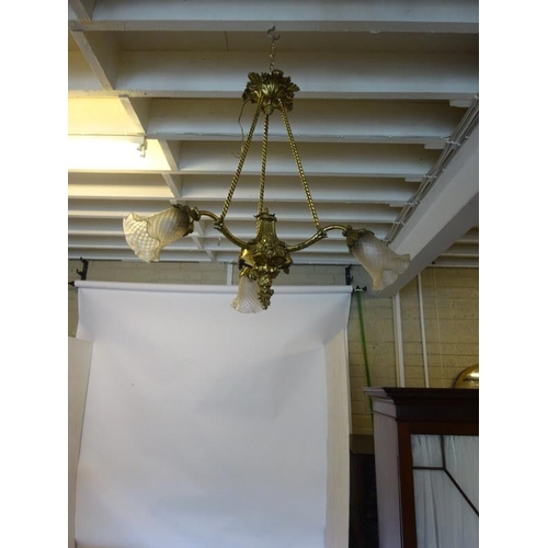 89 - Good antique brass three branch chandelier with frosted glass shades.