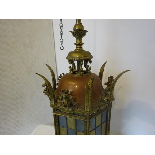 98 - Antique brass and copper hall lantern with colour glass panels. Overall height 120cm approx.