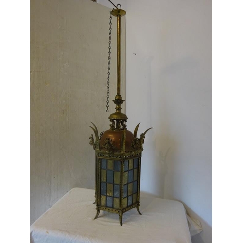 98 - Antique brass and copper hall lantern with colour glass panels. Overall height 120cm approx.