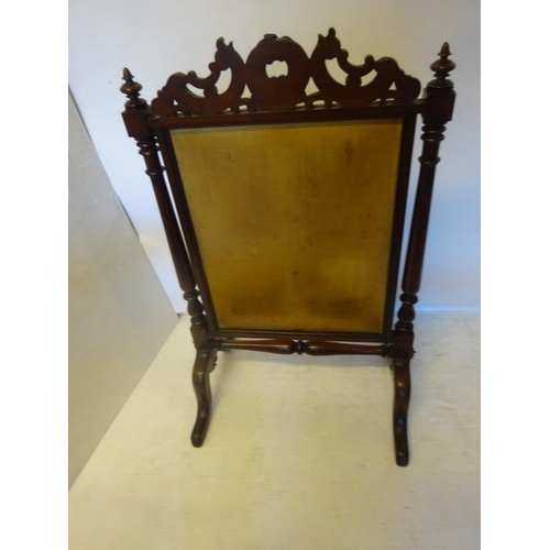 99 - Good Victorian carved mahogany firescreen with needlework panel. H. 110cm, W. 69cm approx.