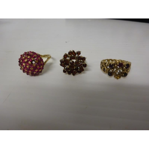 291 - Three 9 carat gold dress rings (2 with stones missing).