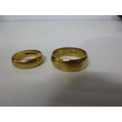 294 - Two 9 carat gold wedding bands. 10 grams. Sizes S and K.