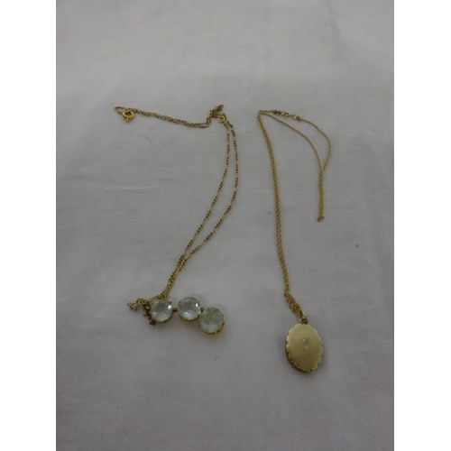 298 - Gold chain with locket and gold chain with coloured stones.