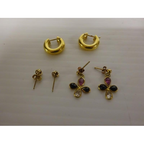 303 - Three pairs of earrings.