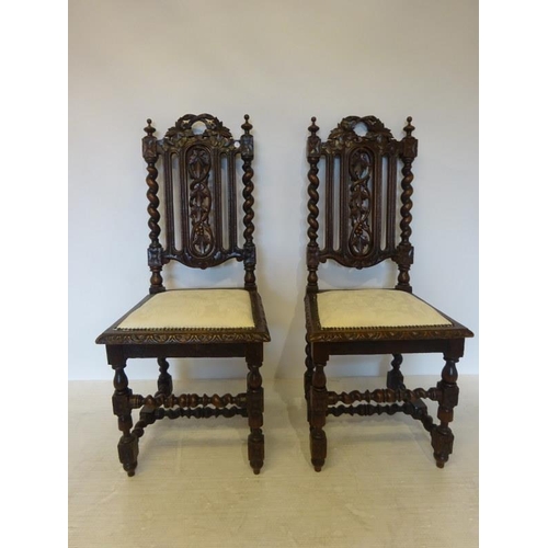 322 - Pair of Jacobean design carved oak chairs.