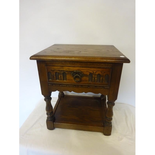 326 - Small low oak table fitted with a drawer.