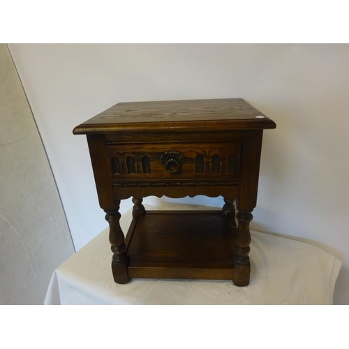 326 - Small low oak table fitted with a drawer.