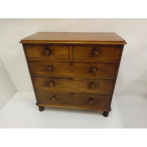 327 - An early Victorian mahogany chest of two short and three long drawers, original handles and raised o... 