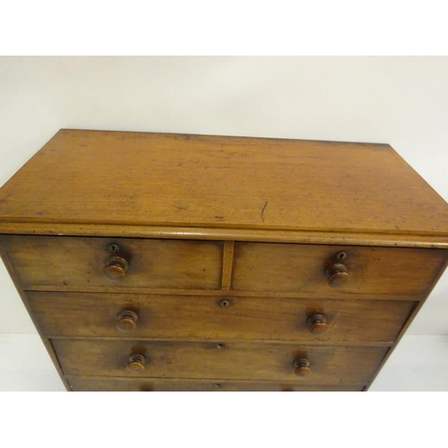 327 - An early Victorian mahogany chest of two short and three long drawers, original handles and raised o... 