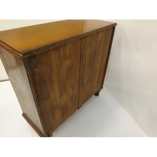 327 - An early Victorian mahogany chest of two short and three long drawers, original handles and raised o... 