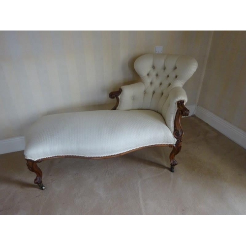 341 - Victorian walnut chaise lounge raised on cabriole legs.