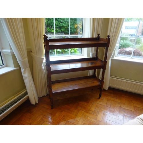 352 - A Victorian pitch pine three tier dumbwaiter. W. 103cm, D. 35cm, H. 123cm approx.