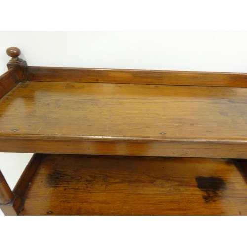 352 - A Victorian pitch pine three tier dumbwaiter. W. 103cm, D. 35cm, H. 123cm approx.