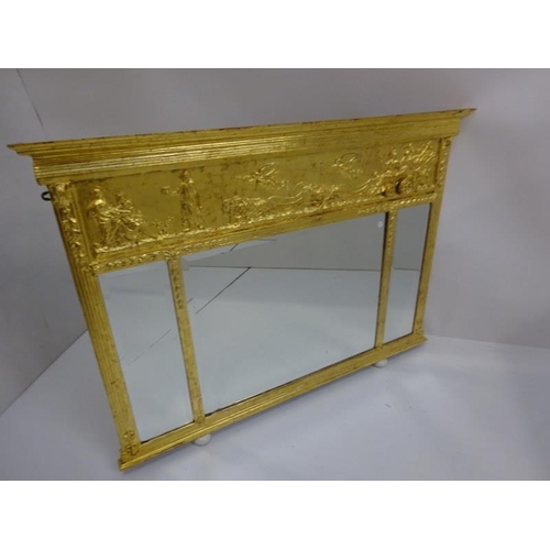 353 - Antique gilt framed over mantle mirror with chariot decoration. 124cm x 90cm.