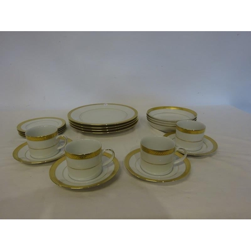 361 - Part Fairmont china dinner service with gold rim.