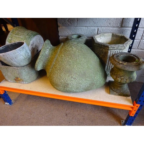 66 - A collection of stone garden planters, etc. (7 approx.)