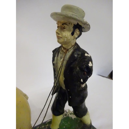 7 - Farmer with pig on rectangular base. (restoration required) L. 55cm approx.