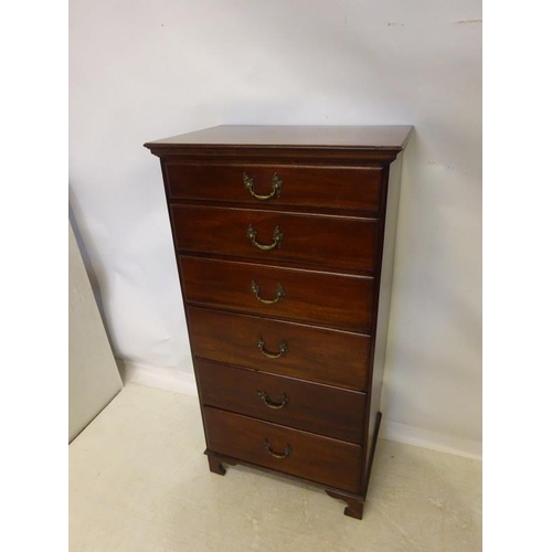 108 - Antique mahogany tall boy chest of 6 graduated drawers raised on bracket feet. H. 132cm, W. 69cm, D.... 