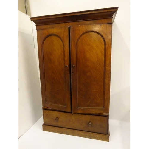 113 - Victorian mahogany two door wardrobe with deep base drawer. H. 218cm, W. 135cm. D. 60cm approx.